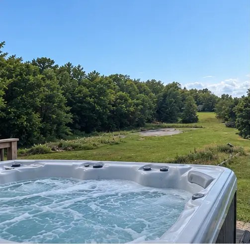 Outdoor hot tub overlooking the fields